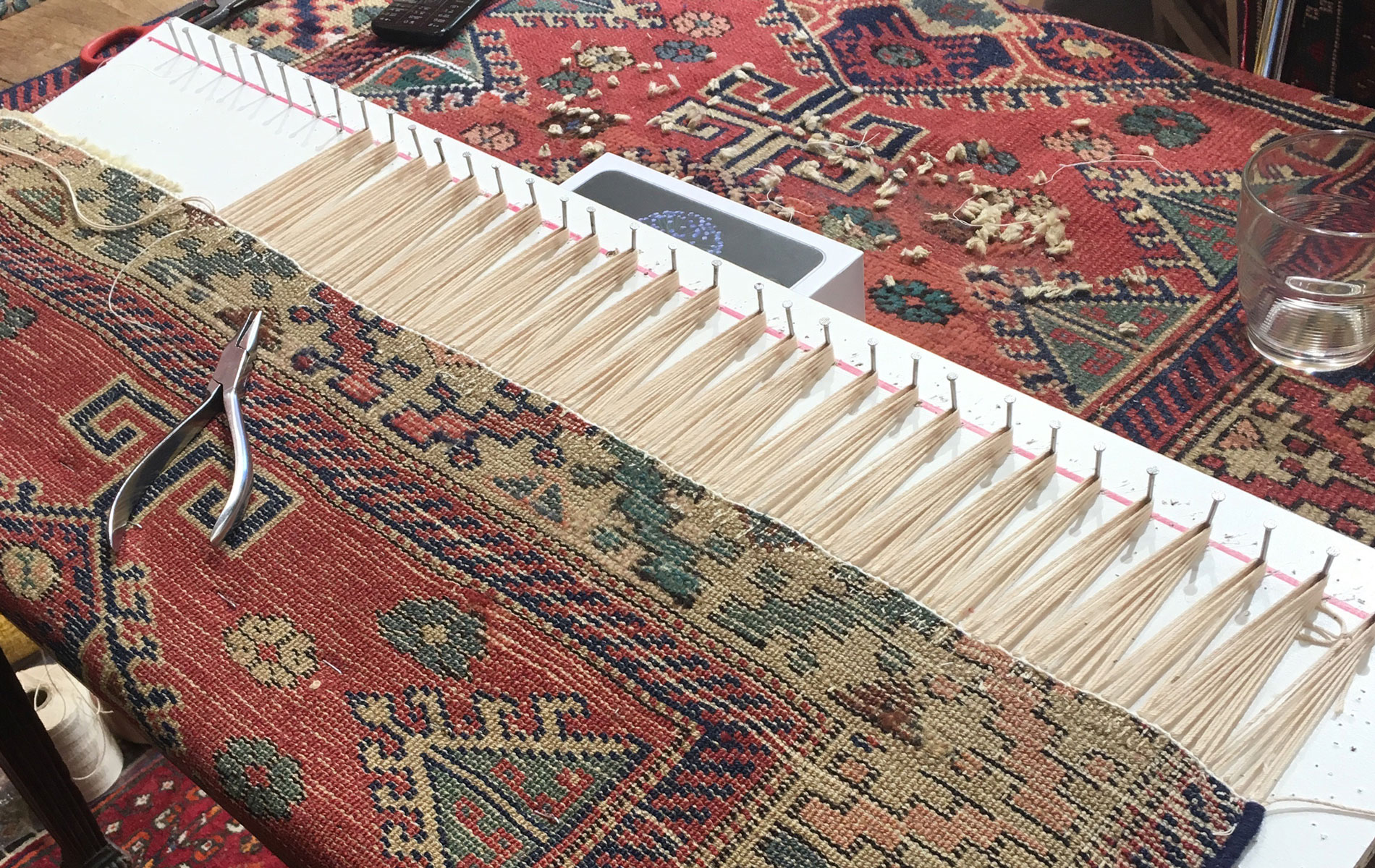 Réparation de franges de tapis à Saint Cloud