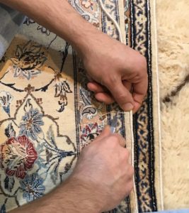 Restauration des bordures d'un tapis à saint Cloud